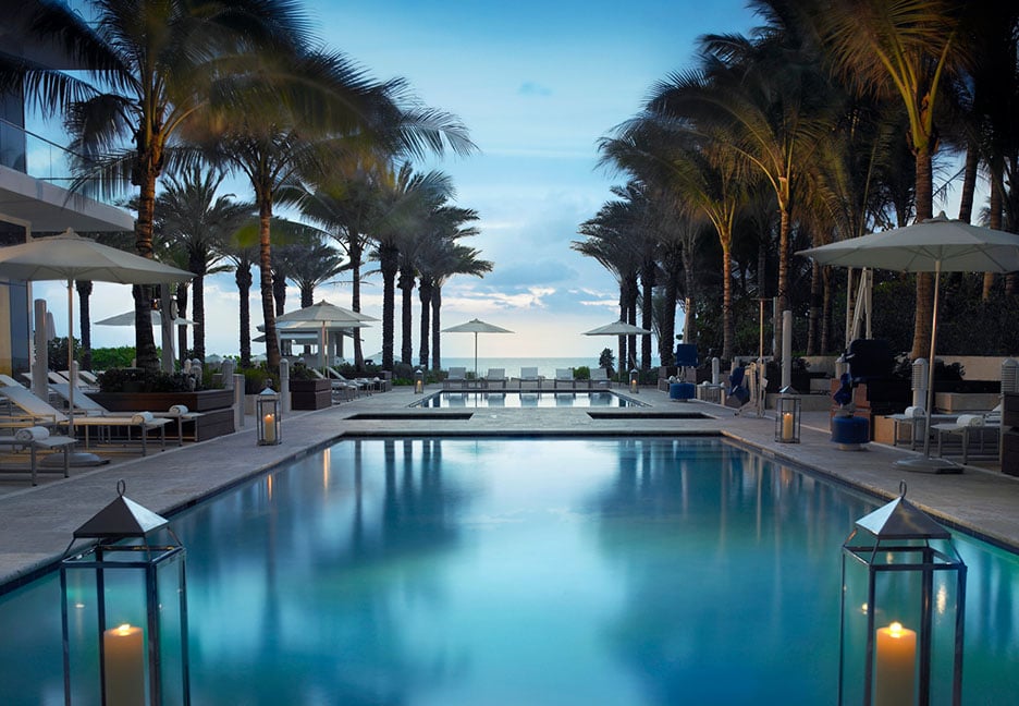 beach-side pool at dusk